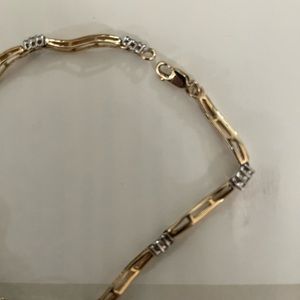 Gold and diamond bracket beautiful only worn a few times.